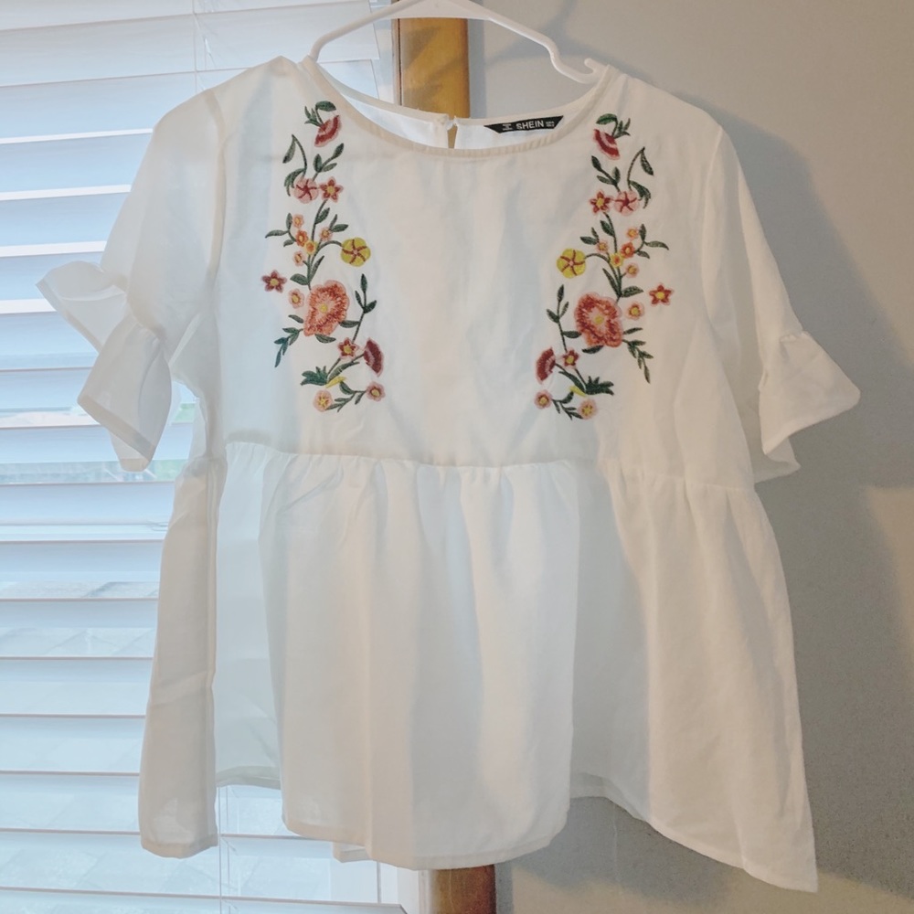 white embroidered blouse